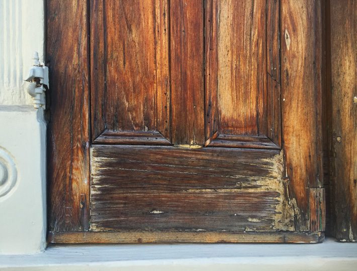 Rehabilitated historic cypress wood door in the French Quarter