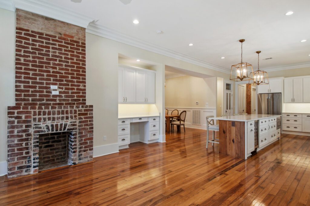 Lafayette - Kitchen and exposed brick fireplace